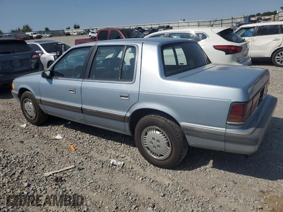 1989 Dodge Spirit z VIN 1B3BA46K1KF408949, wystawiony jako Copart lot #80767594 z przebiegiem 137 766 mil mil oraz Nie do naprawy. Historia ofert i sprzedaży dostępna na DreamBid. Obrazek 2.
