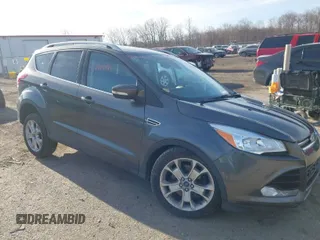 2015 Ford Escape Titanium with VIN 1FMCU9J90FUB58306, listed as a IAAI auction lot 41815151 with 136,835 mi miles. Bid and sale history available at carsss.com. Image 1.