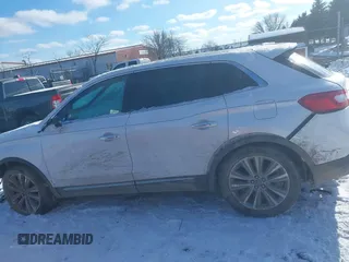 2016 Lincoln MKX Reserve with VIN 2LMTJ8LP3GBL38650, listed as a IAAI auction lot 41338134 with 128,078 mi miles. Bid and sale history available at carsss.com. Image 14.