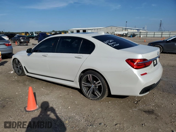 2016 BMW 7 Series 740i with VIN WBA7E2C58GG548314, listed as a Copart auction lot 72876922 with 74,981 mi miles. Bid and sale history available at carsss.com. Image 2.