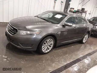 2015 Ford Taurus Limited with VIN 1FAHP2F87FG136199, listed as a IAAI auction lot 41920715 with 173,445 mi miles. Bid and sale history available at carsss.com. Image 2.