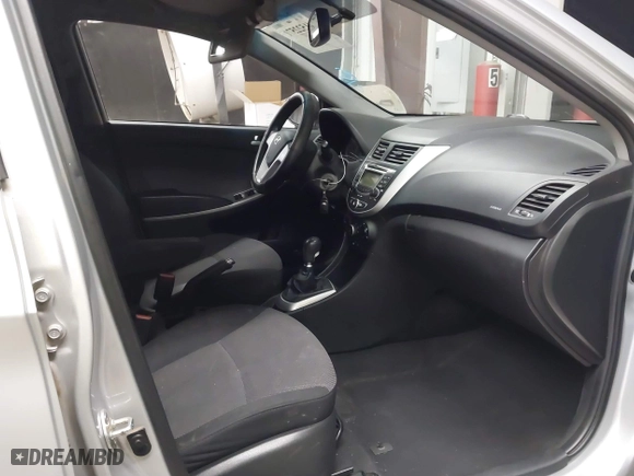 2013 Hyundai Accent GL with VIN KMHCT5AE3DU104651, listed as a IAAI auction lot 41522571 with 147,324 mi miles. Bid and sale history available at carsss.com. Image 5.