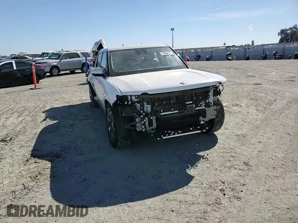 2024 Rivian R1T Adventure z VIN 7FCTGCAA9RN030318, wystawiony jako Copart lot #77036474 z przebiegiem 3 522 mil mil oraz Szkoda całkowita • Salvage title. Historia ofert i sprzedaży dostępna na DreamBid. Obrazek 11.
