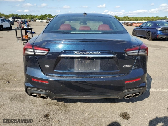 2022 Maserati Ghibli Modena Q4 with VIN ZAM57YTM7N1388954, listed as a Copart auction lot 70619264 with 24,909 mi miles and Salvage Title. Bid and sale history available at carsss.com. Image 6.