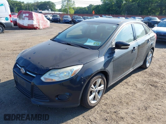 2013 Ford Focus SE with VIN 1FADP3F21DL230177, listed as a IAAI auction lot 42579815 with 243,525 mi miles and . Bid and sale history available at DreamBid. Image 12.