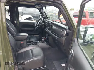 2021 Jeep Gladiator 80th Anniversary с VIN 1C6HJTAG3ML597461, выставлен на аукционе IAAI как лот 42266529 с пробегом 33 863 миль миль и . История ставок и продаж доступна на DreamBid. Изображение 5.