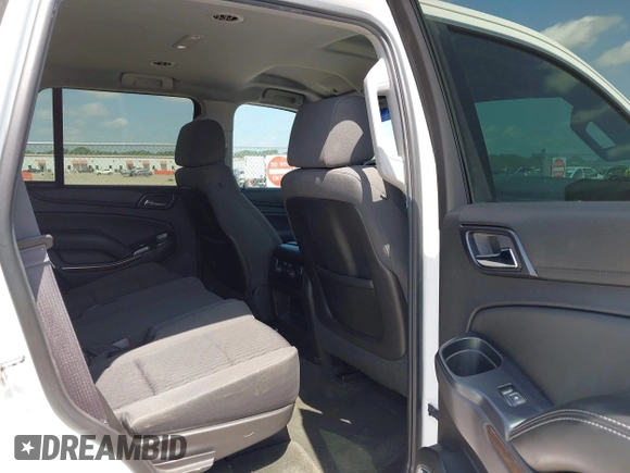 2015 Chevrolet Tahoe LS z VIN 1GNSCAKC6FR239156, wystawiony jako IAAI lot #42545513 z przebiegiem 117 863 mil mil oraz . Historia ofert i sprzedaży dostępna na DreamBid. Obrazek 8.