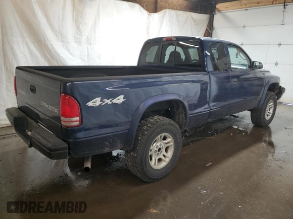 2004 Dodge Dakota Sport with VIN 1D7HG32N54S525290, listed as a Copart auction lot 77141804 with 217,012 mi miles and Salvage Title. Bid and sale history available at carsss.com. Image 3.