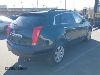 2015 Cadillac SRX z VIN 3GYFNAE32FS543933, wystawiony jako IAAI lot #41578338 z przebiegiem 150 937 mil mil oraz . Historia ofert i sprzedaży dostępna na DreamBid. Obrazek 4.