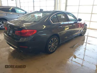 2018 BMW 5 Series 530i xDrive with VIN WBAJA7C55JWA73459, listed as a IAAI auction lot 41634921 with 64,759 mi miles and . Bid and sale history available at carsss.com. Image 4.