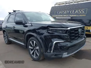 2024 Honda Pilot Touring z VIN 5FNYG1H70RB032368, wystawiony jako IAAI lot #41805758 z przebiegiem 13 078 mil mil oraz . Historia ofert i sprzedaży dostępna na DreamBid. Obrazek 6.