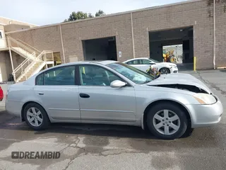 2002 Nissan Altima S with VIN 1N4AL11D62C717139, listed as a IAAI auction lot 41569217 with 135,200 mi miles. Bid and sale history available at carsss.com. Image 14.