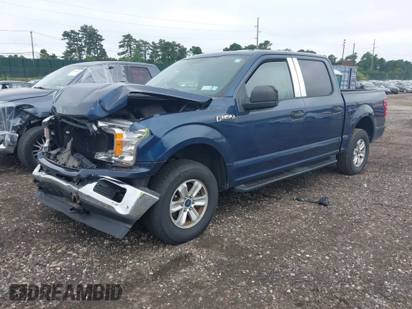 2018 Ford F-150 XL with VIN 1FTEW1EP6JKF00220, listed as a IAAI auction lot 42669759 with 93,996 mi miles and . Bid and sale history available at DreamBid. Image 2.
