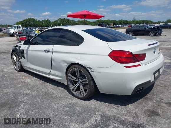 2014 BMW 6 Series 650i with VIN WBAYM9C55ED248244, listed as a IAAI auction lot 42043456 with 144,664 mi miles and . Bid and sale history available at DreamBid. Image 3.