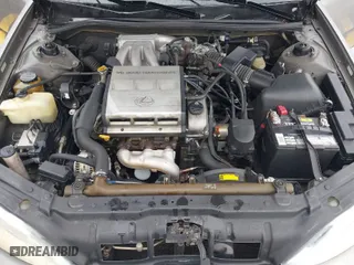 1997 Lexus ES 300 Luxury Sport Sdn with VIN JT8BF22G4V0046594, listed as a IAAI auction lot 41392104 with 244,372 mi miles. Bid and sale history available at carsss.com. Image 10.