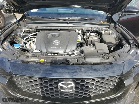 2024 Mazda CX-50 2.5 S Premium Package with VIN 7MMVABDMXRN191406, listed as a Copart auction lot 74772714 with 11,428 mi miles and Salvage Title. Bid and sale history available at carsss.com. Image 12.