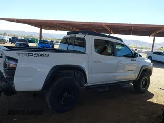 2016 Toyota Tacoma SR with VIN 5TFCZ5ANXGX028464, listed as a IAAI auction lot 41834385 with 124,407 mi miles and . Bid and sale history available at DreamBid. Image 12.