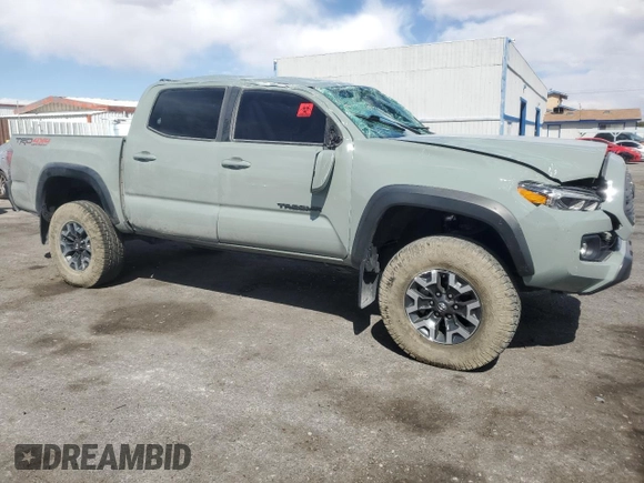 2023 Toyota Tacoma SR with VIN 3TMCZ5AN3PM563612, listed as a Copart auction lot 53995225 with 37,699 mi miles and Salvage title. Bid and sale history available at DreamBid. Image 4.