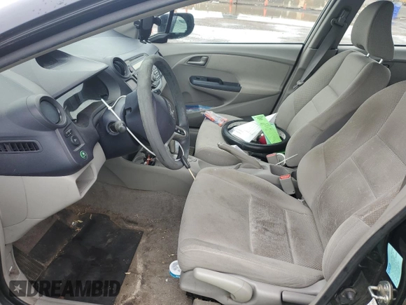 2010 Honda Insight LX with VIN JHMZE2H59AS022362, listed as a Copart auction lot 59442435 with 161,009 mi miles and Salvage title. Bid and sale history available at DreamBid. Image 7.