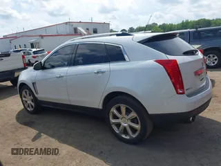2014 Cadillac SRX Performance Collection with VIN 3GYFNFE34ES677712, listed as a IAAI auction lot 42668059 with 150,135 mi miles and . Bid and sale history available at DreamBid. Image 14.