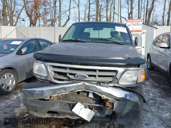 2003 Ford F-150 XL with VIN 2FTRX18W73CB07559, listed as a IAAI auction lot 41452402 with 152,509 mi miles. Bid and sale history available at carsss.com. Image 6.