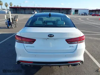 2016 Kia Optima SXL Turbo with VIN 5XXGV4L20GG023095, listed as a IAAI auction lot 41580598 with 155,002 mi miles. Bid and sale history available at carsss.com. Image 16.