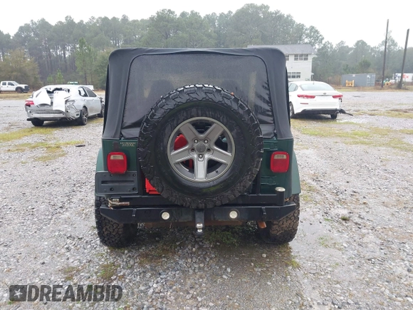 2000 Jeep Wrangler Sahara with VIN 1J4FA59SXYP701098, listed as a IAAI auction lot 41592872 with 1 mi miles. Bid and sale history available at carsss.com. Image 15.
