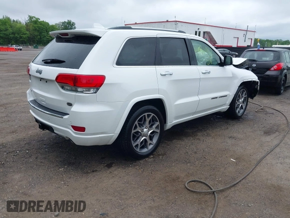 2020 Jeep Grand Cherokee Overland z VIN 1C4RJFCG9LC197401, wystawiony jako IAAI lot #42186412 z przebiegiem 64 870 mil mil oraz . Historia ofert i sprzedaży dostępna na DreamBid. Obrazek 4.
