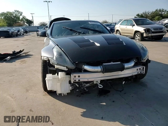 2017 Nissan 370Z z VIN JN1AZ4EH1HM950035, wystawiony jako Copart lot #70534664 z przebiegiem 63 667 mil mil oraz Szkoda całkowita • Salvage title. Historia ofert i sprzedaży dostępna na DreamBid. Obrazek 11.