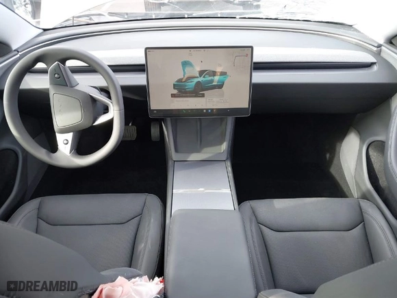 2025 Tesla Model 3 Long Range with VIN 5YJ3E1EA4SF914133, listed as a IAAI auction lot 41706994 with 1,932 mi miles. Bid and sale history available at carsss.com. Image 5.