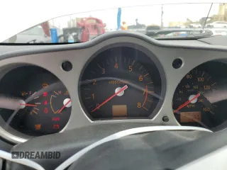 2004 Nissan 350Z Touring with VIN JN1AZ34D74T160909, listed as a Copart auction lot 58302075 with 54,100 mi miles and Salvage title. Bid and sale history available at DreamBid. Image 9.