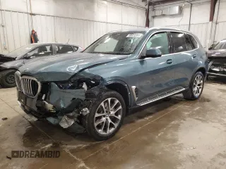 2026 BMW X5 xDrive40i z VIN 5UX23EU04T9052995, wystawiony jako Copart lot #61350465 z przebiegiem Nie podano mil oraz Czysty tytuł • Clean title. Historia ofert i sprzedaży dostępna na DreamBid. Obrazek 1.