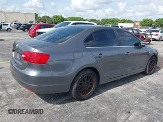 2013 Volkswagen Jetta SE with VIN 3VWDP7AJ1DM280251, listed as a IAAI auction lot 42391472 with 98,788 mi miles and . Bid and sale history available at DreamBid. Image 4.