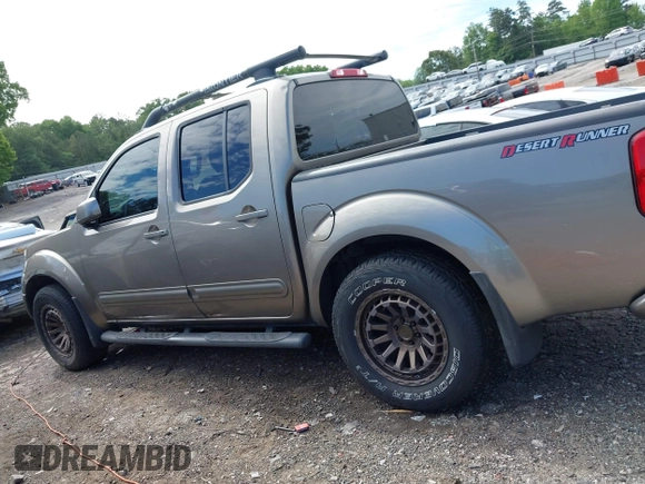 2005 Nissan Frontier LE with VIN 1N6AD07UX5C447844, listed as a IAAI auction lot 42184393 with 202,226 mi miles and . Bid and sale history available at DreamBid. Image 14.