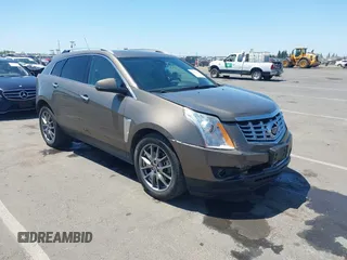 2015 Cadillac SRX Performance Collection z VIN 3GYFNFE35FS569682, wystawiony jako IAAI lot #42322229 z przebiegiem 124 365 mil mil oraz . Historia ofert i sprzedaży dostępna na DreamBid. Obrazek 1.