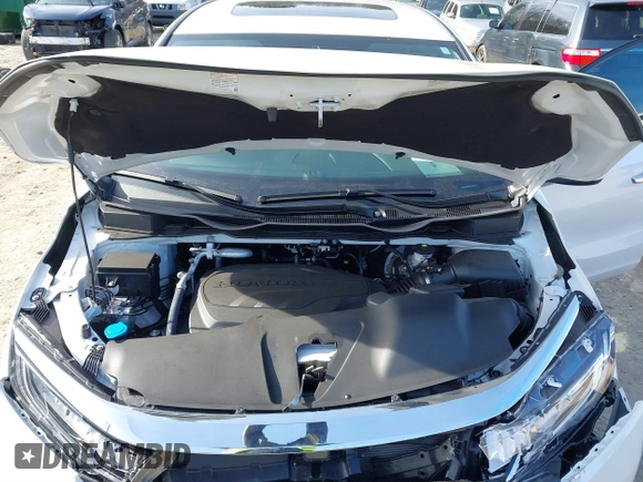 2024 Honda Odyssey EX-L with VIN 5FNRL6H6XRB070789, listed as a IAAI auction lot 41333384 with 6,553 mi miles and . Bid and sale history available at DreamBid. Image 10.
