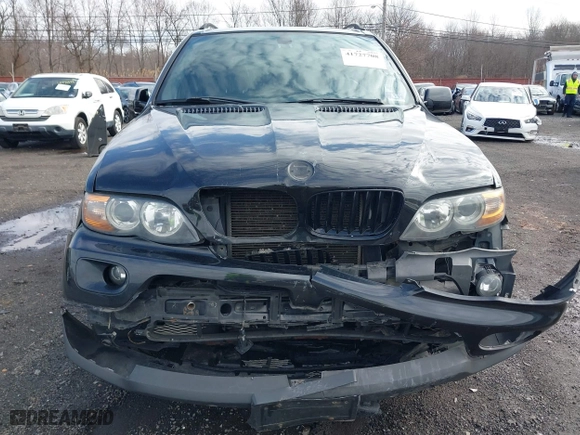 2006 BMW X5 4.4i with VIN 5UXFB53506LV22836, listed as a IAAI auction lot 41727708 with 186,084 mi miles. Bid and sale history available at carsss.com. Image 12.