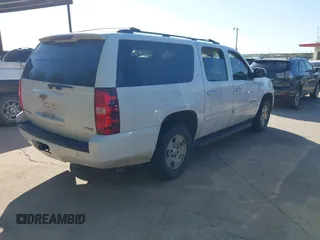 2011 Chevrolet Suburban LT with VIN 1GNSCJE06BR309881, listed as a IAAI auction lot 42577452 with 254,073 mi miles and . Bid and sale history available at DreamBid. Image 4.
