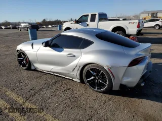 2020 Toyota GR Supra 3.0 with VIN WZ1DB4C08LW031739, listed as a Copart auction lot 79266674 with 26,582 mi miles and Salvage Title. Bid and sale history available at carsss.com. Image 2.