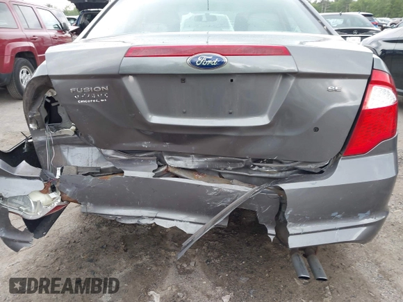 2012 Ford Fusion SE z VIN 3FAHP0HA1CR424096, wystawiony jako IAAI lot #42364116 z przebiegiem 53 026 mil mil oraz . Historia ofert i sprzedaży dostępna na DreamBid. Obrazek 6.