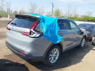 2023 Honda CR-V EX-L with VIN 2HKRS4H79PH431282, listed as a IAAI auction lot 42072364 with 15,295 mi miles and . Bid and sale history available at carsss.com. Image 4.