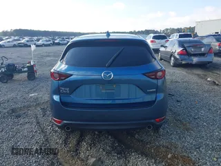 2020 Mazda CX-5 Touring with VIN JM3KFACM0L0775020, listed as a IAAI auction lot 40876970 with 96,424 mi miles. Bid and sale history available at carsss.com. Image 15.