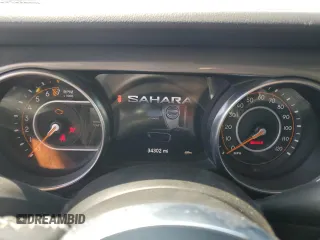 2021 Jeep Wrangler Unlimited Sahara с VIN 1C4HJXEG2MW862783, выставлен на аукционе Copart как лот 65708314 с пробегом 34 302 миль миль и На запчасти • Non repairable. История ставок и продаж доступна на DreamBid. Изображение 9.