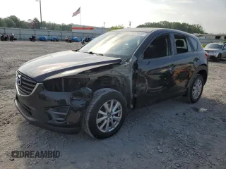 2016 Mazda CX-5 Sport z VIN JM3KE4BY6G0749973, wystawiony jako Copart lot #54131635 z przebiegiem 97 480 mil mil oraz Szkoda całkowita • Salvage title. Historia ofert i sprzedaży dostępna na DreamBid. Obrazek 1.
