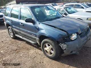 2001 Ford Escape XLT with VIN 1FMYU03181KC56156, listed as a IAAI auction lot 41231100 with 262,875 mi miles. Bid and sale history available at carsss.com. Image 1.