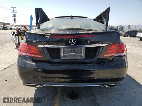 2015 Mercedes-Benz E 400 with VIN WDDKJ6FB1FF300725, listed as a Copart auction lot 63770125 with 41,009 mi miles and Salvage title. Bid and sale history available at DreamBid. Image 6.