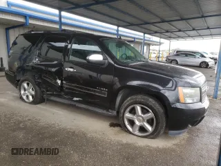 2011 Chevrolet Tahoe LS with VIN 1GNSCAE09BR364423, listed as a Copart auction lot 48346675 with 199,099 mi miles and Salvage title. Bid and sale history available at DreamBid. Image 4.
