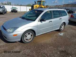 2001 Ford Focus SE z VIN 1FAFP363X1W343475, wystawiony jako IAAI lot #42390133 z przebiegiem 127 282 mil mil oraz . Historia ofert i sprzedaży dostępna na DreamBid. Obrazek 2.