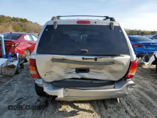 2004 Jeep Grand Cherokee Laredo z VIN 1J4GW48S84C200617, wystawiony jako Copart lot #51732045 z przebiegiem 171 452 mil mil oraz Nie do naprawy • Non repairable. Historia ofert i sprzedaży dostępna na DreamBid. Obrazek 6.