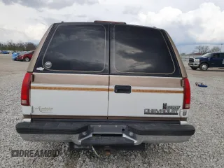 1999 Chevrolet Suburban with VIN 3GNEC16R9XG143471, listed as a Copart auction lot 53856565 with 208,621 mi miles and Salvage title. Bid and sale history available at DreamBid. Image 6.